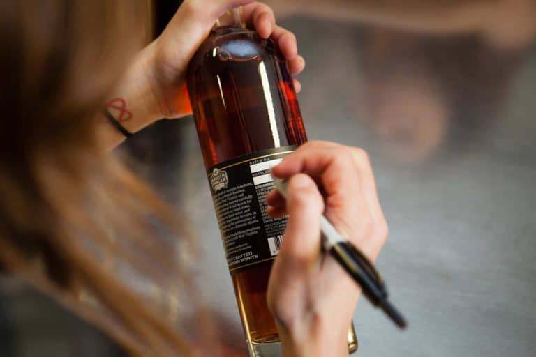 Smoother ambler bottle being written on