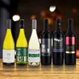 Everyday Wines on a Wooden table with dark bokeh background
