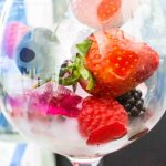 Glass with ice and fruitt close up