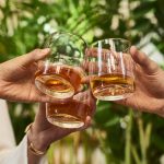 Glenlivet 15 year old in glass, toasting