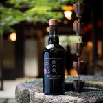 Ki no Bi on wood stump