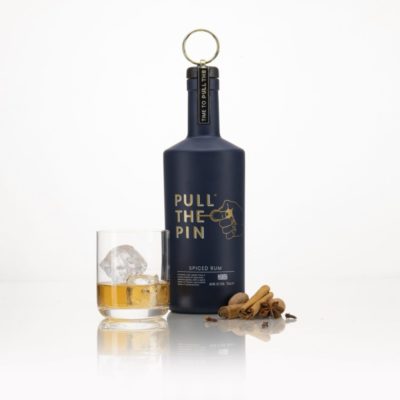 Pull The Pin Spiced Rum with glass