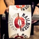 Nailbiter labels on machine