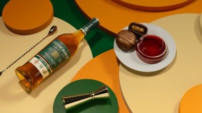 The Quinta Ruban on a table with honey and jigger