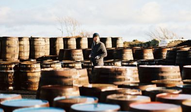 Glenmorangie Man outside in barrels