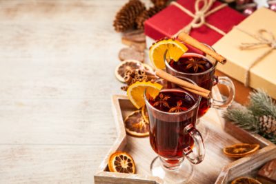 Gluhwein in a glass mug with Christmas decorations